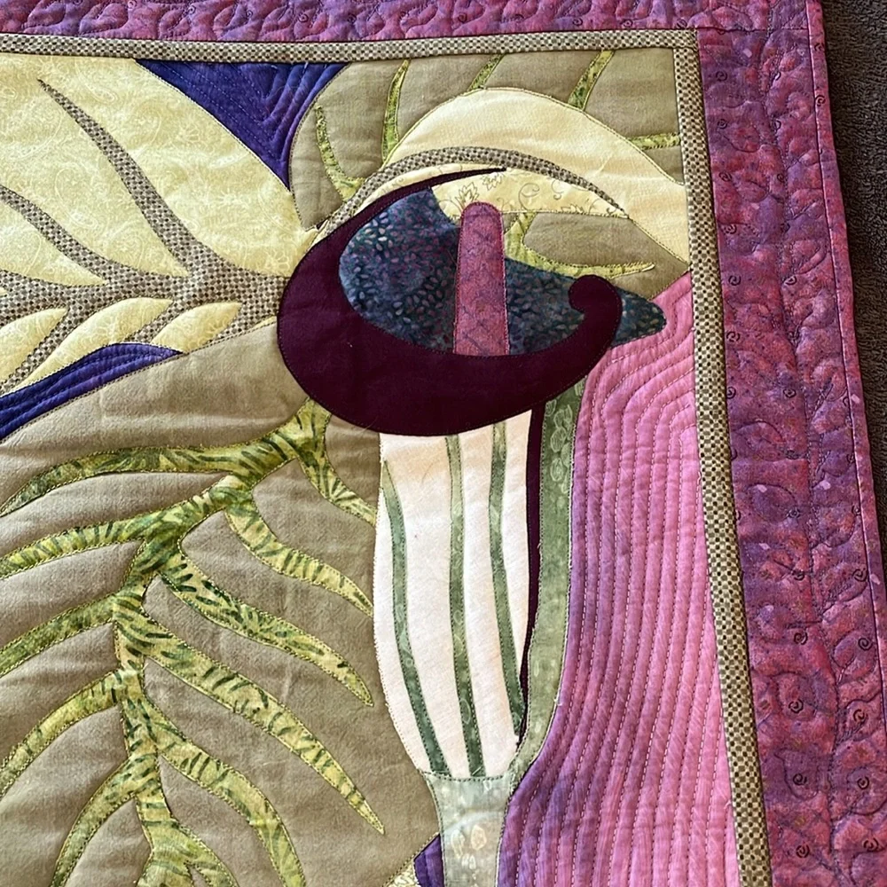 Homemade quilted wall hanging.